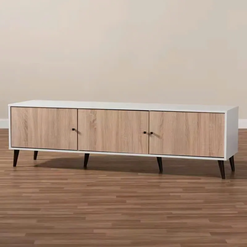 Kệ tivi gỗ MDF 3 cánh cửa mở, chân cao, thiết kế tối giản, đặt trên nền sàn gỗ, phù hợp phòng khách hiện đại.