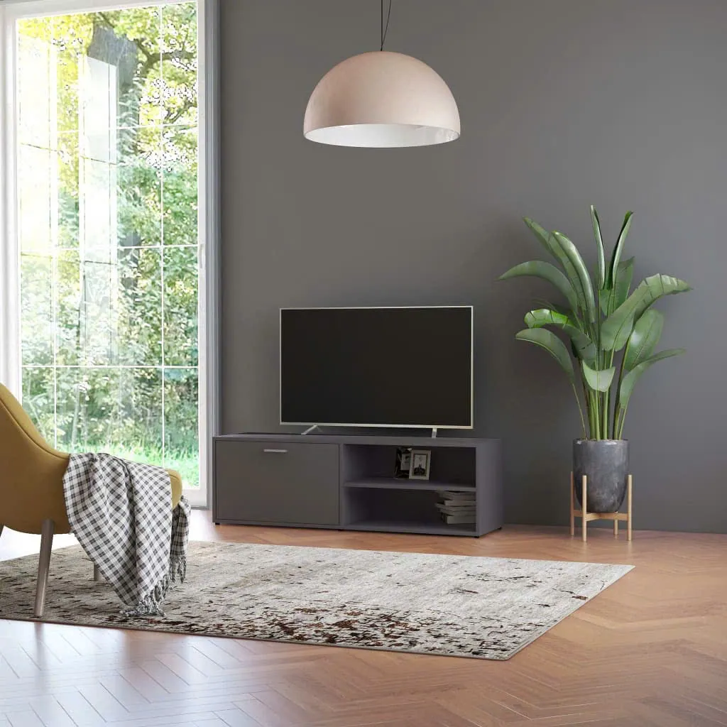 Kệ tivi gỗ MDF dáng thấp, có cánh mở và kệ trang trí mở hai bên, thiết kế hiện đại đặt sát tường, thích hợp cho phòng khách nhỏ gọn.