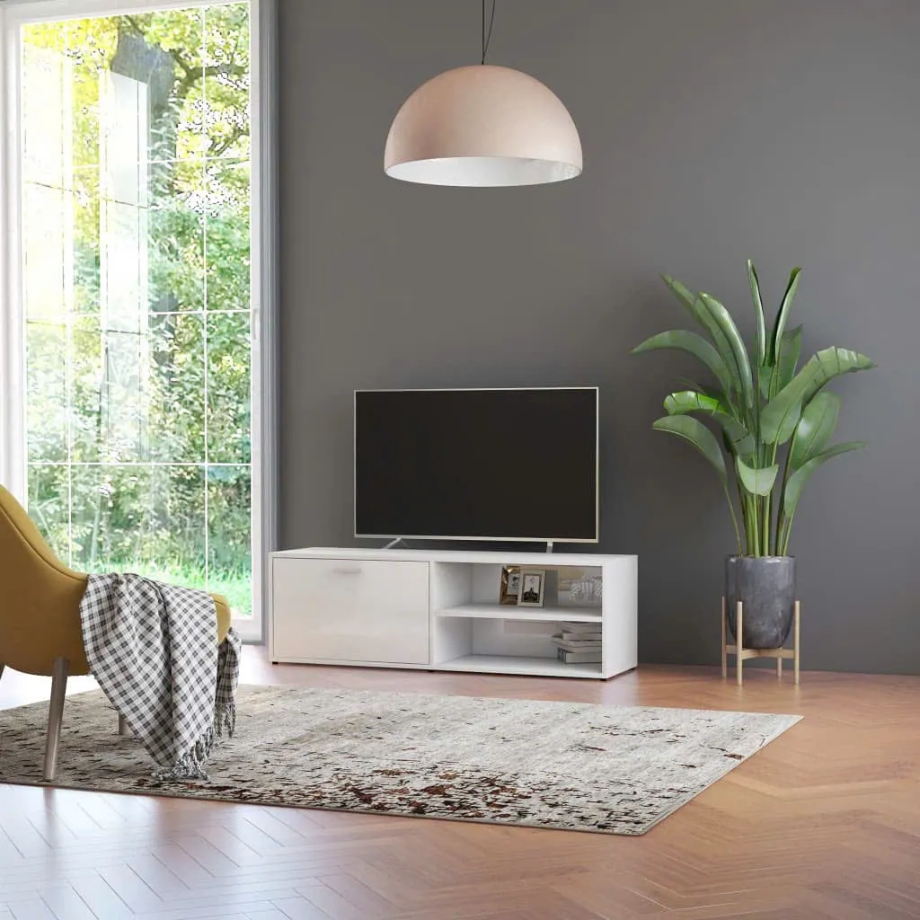 Kệ tivi gỗ MDF dáng thấp, có cánh mở và kệ trang trí mở hai bên, thiết kế hiện đại đặt sát tường, thích hợp cho phòng khách nhỏ gọn.